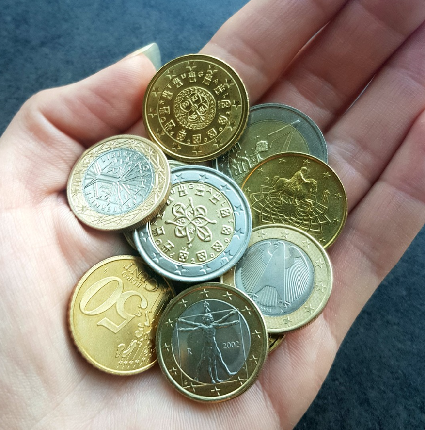 A handful of Euro coins from around Europe